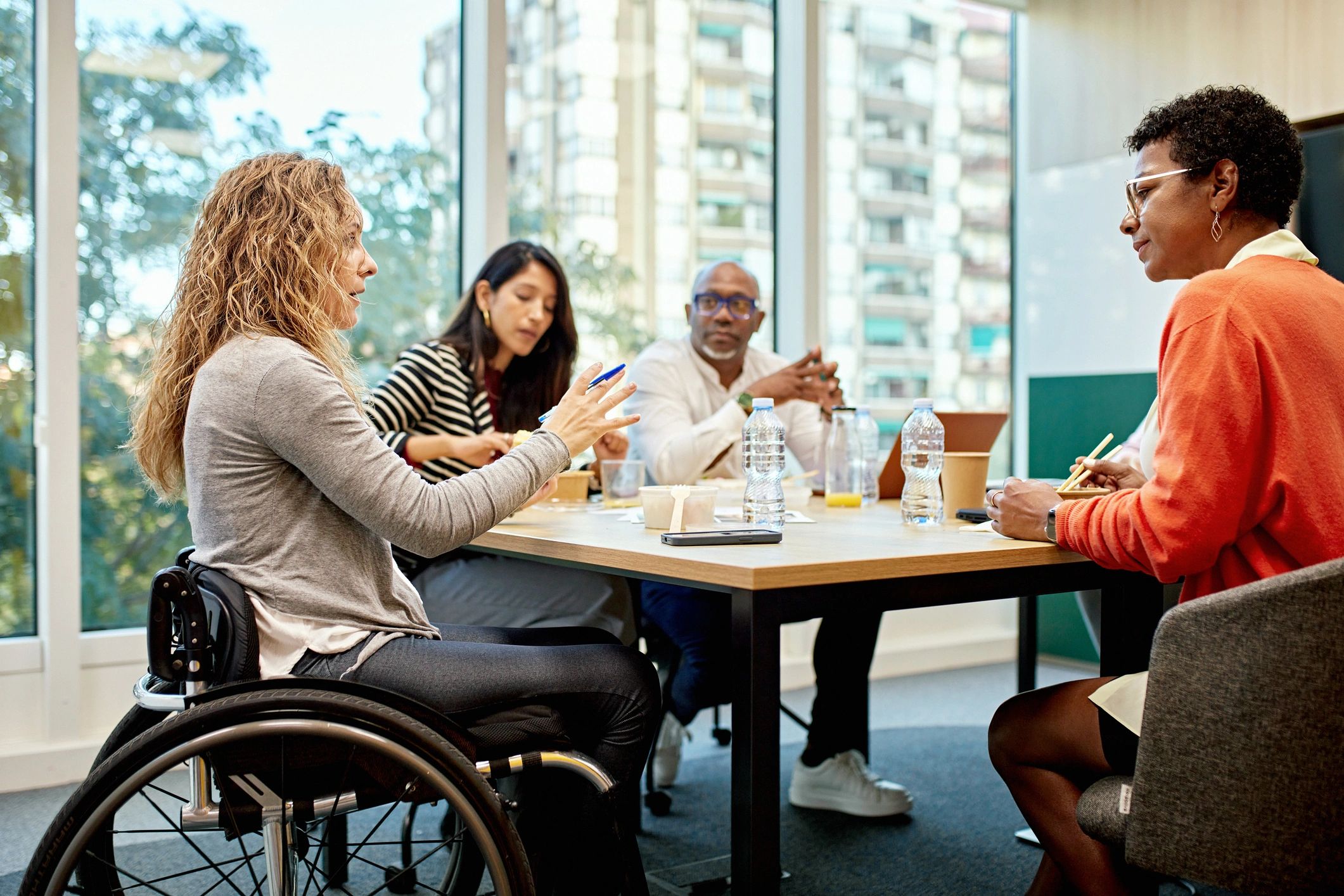 Group discussion in a collaborative meeting room